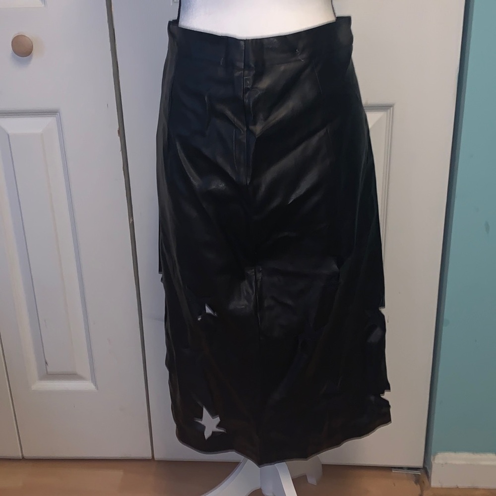 Vinyl pencil skirt with star cut outs by Rehab